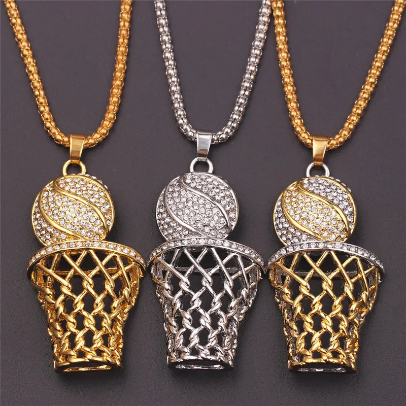 Three basketball hoop pendants in gold, silver on a dark background