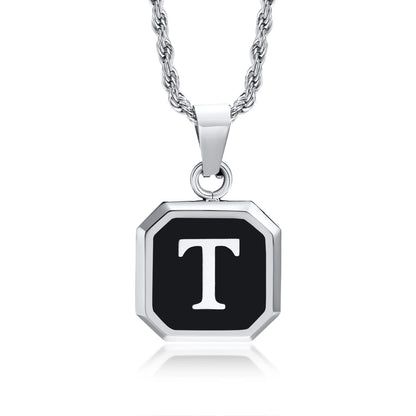 Necklace with a black octagonal pendant featuring the letter 'T'.