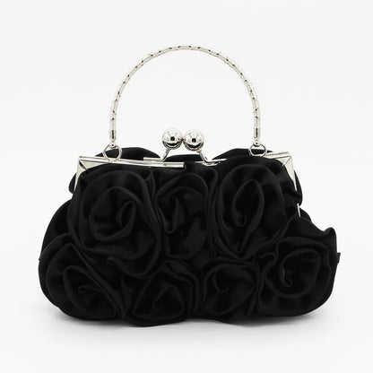 Black rose-themed handbag with a silver clasp on a white background