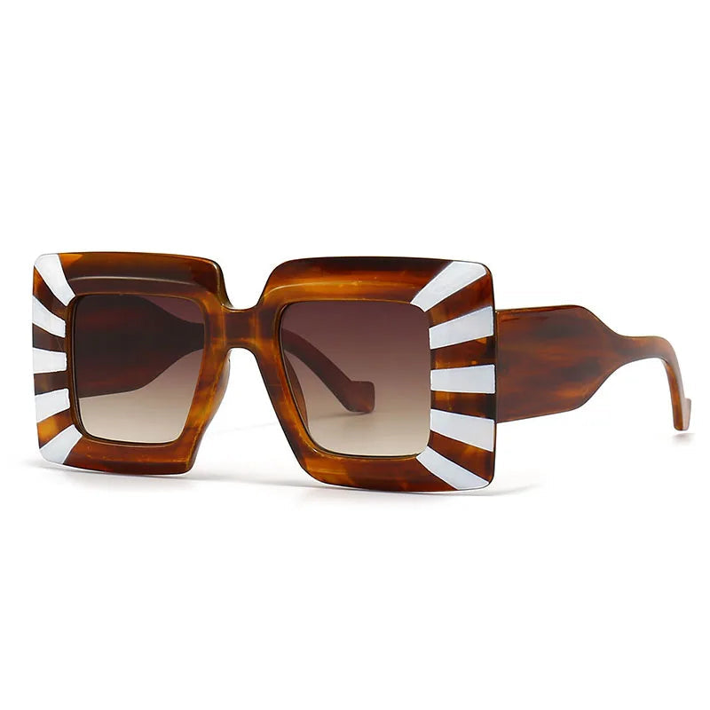 Sunglasses with a distinctive design on a white background