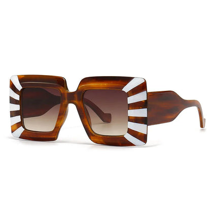 Sunglasses with a distinctive design on a white background