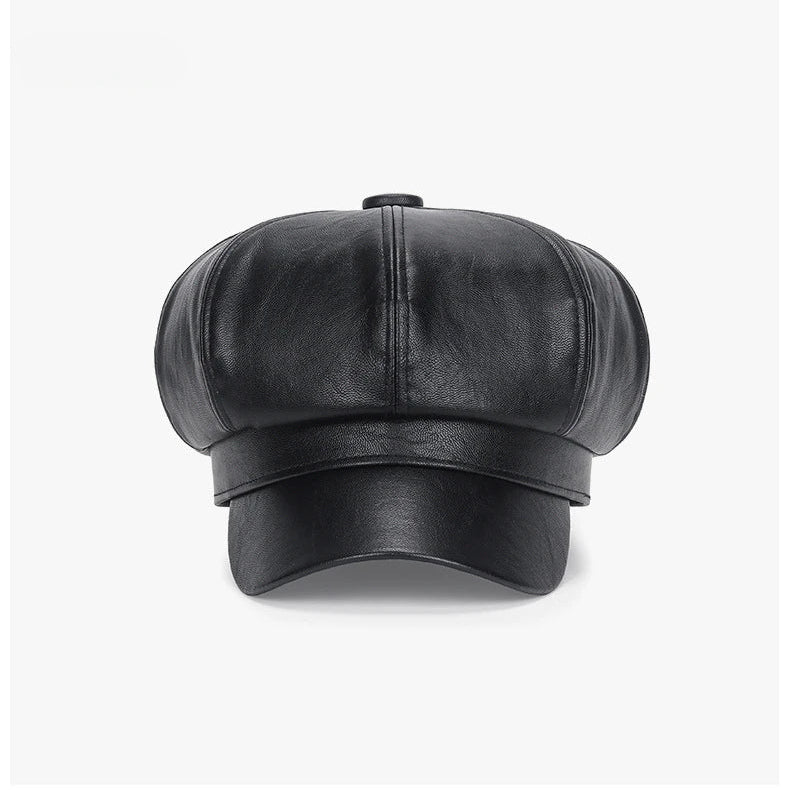 Black leather cap on a white background
