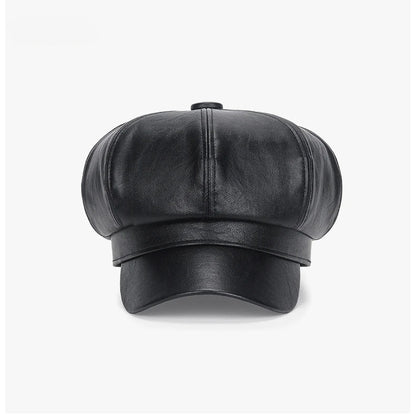 Black leather cap on a white background