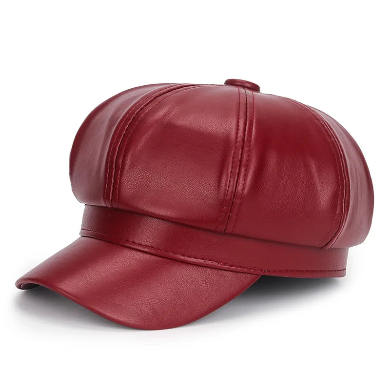 Red leather cap on a white background