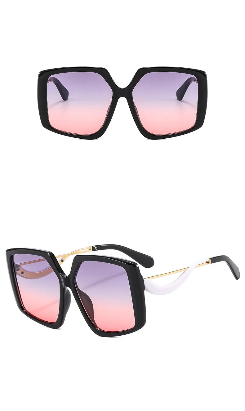 Two views of oversized square sunglasses with black frames, pink-to-purple gradient lenses, and gold and white temple accents on a white background.