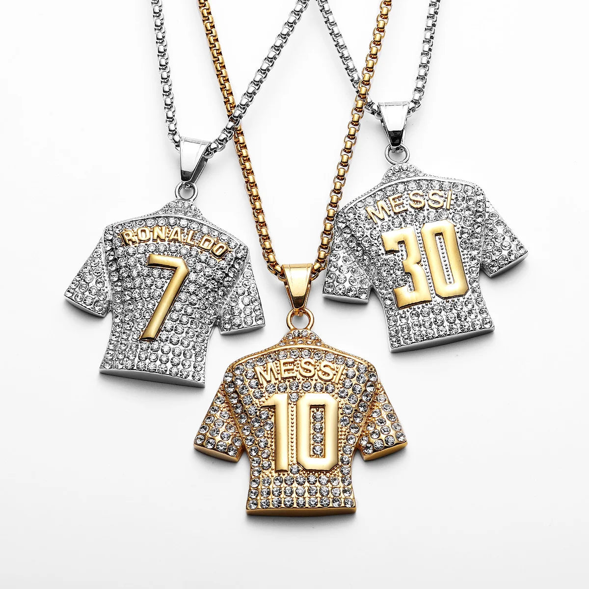 Three pendants shaped like sports jerseys with numbers and names on a white background