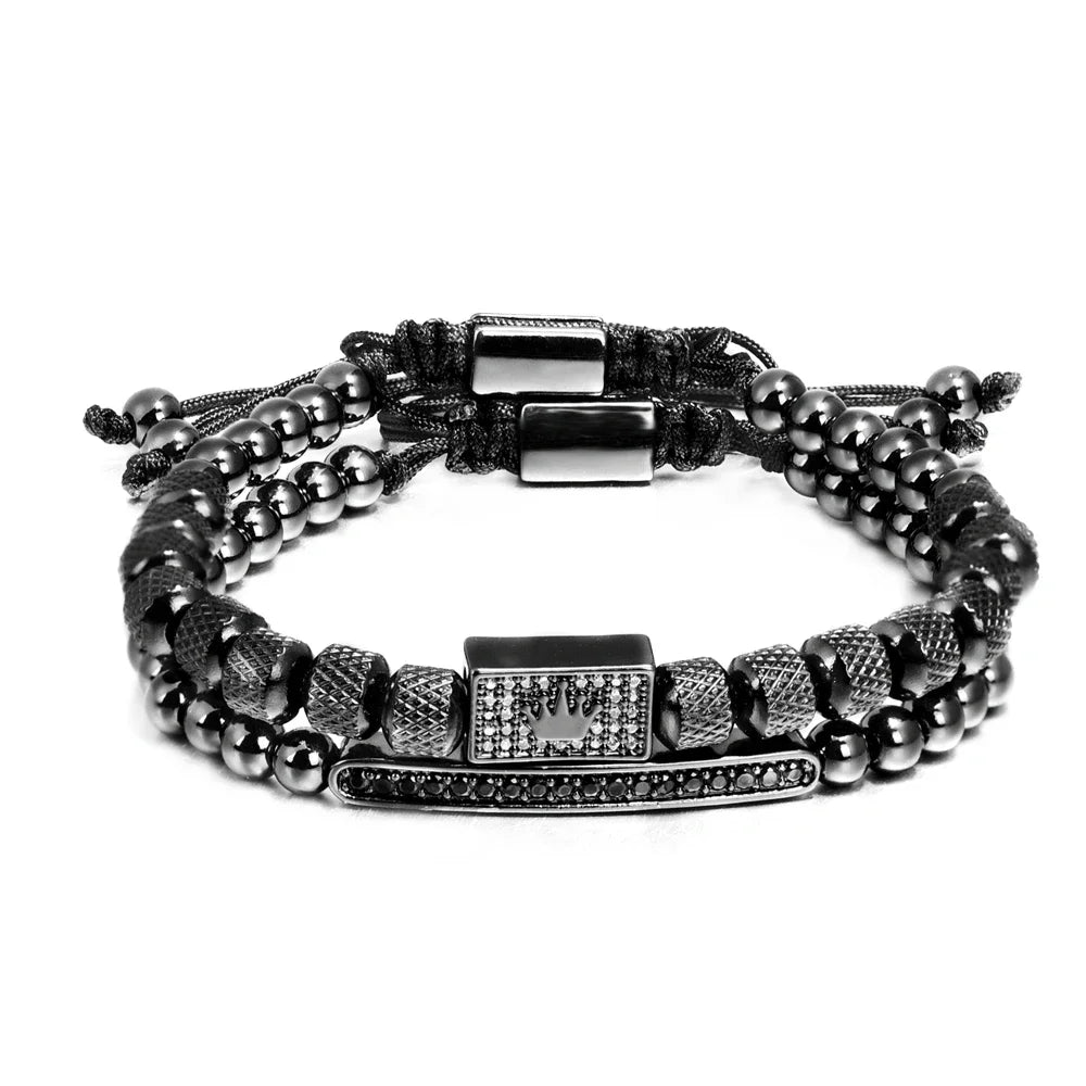 Black beaded bracelet with metal clasp on a white background