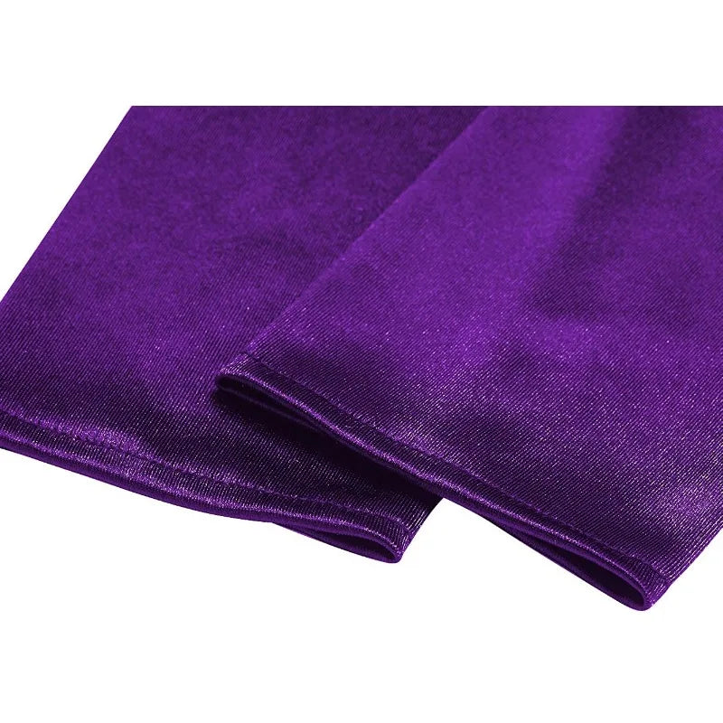 Close-up of a purple fabric with a plain background