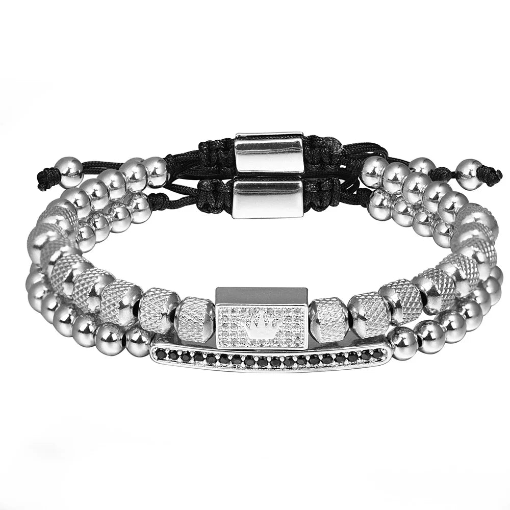 Bracelets with silver beads and metal clasp on a white background