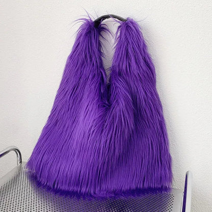 Purple fluffy bag on a trolley against a white wall