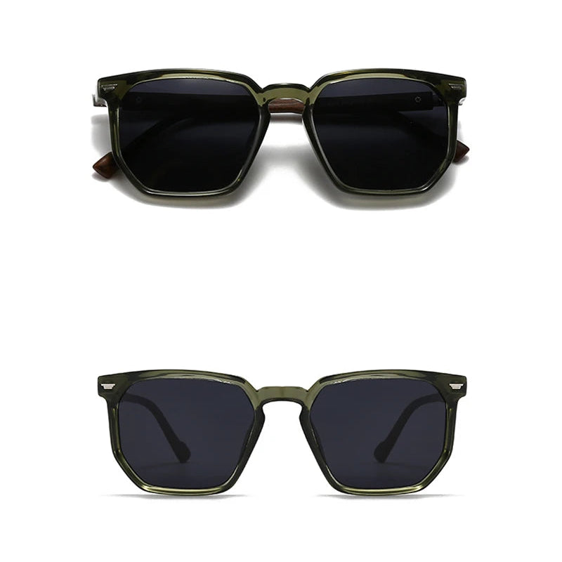 Sunglasses with green and black frame and dark lenses on a white background