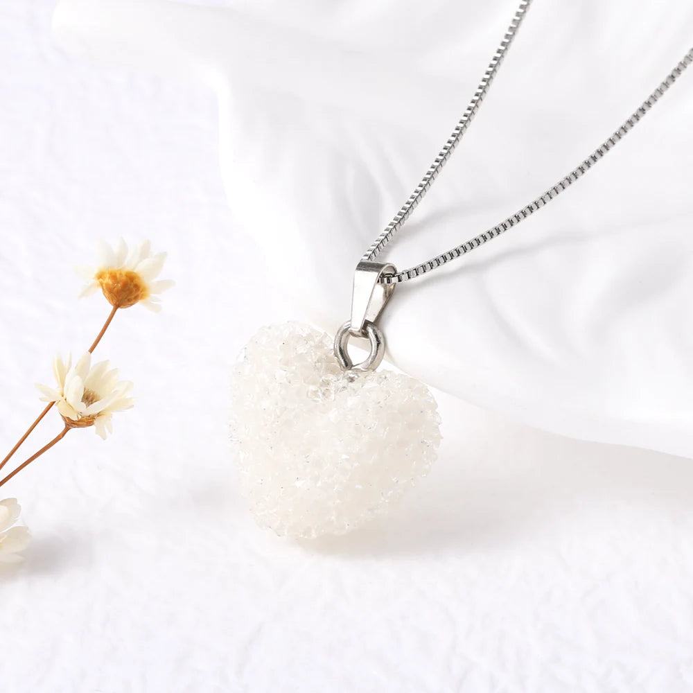 Necklace with a textured white pendant on a light background
