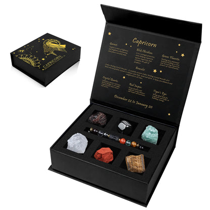 Black box with astrological elements and crystals, featuring the sign Capricorn.