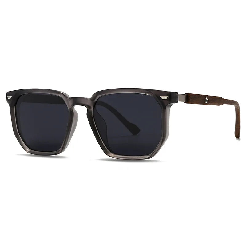 Sunglasses with dark lenses and a wooden arm on a white background