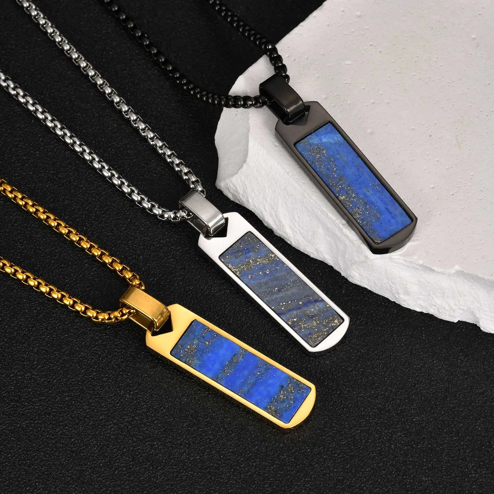 Three necklaces with blue stone pendants on black and white backgrounds