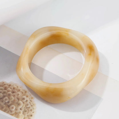 Brown bangle on a white background
