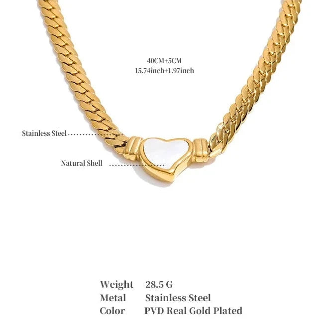 Gold necklace with a heart-shaped pendant on a white background
