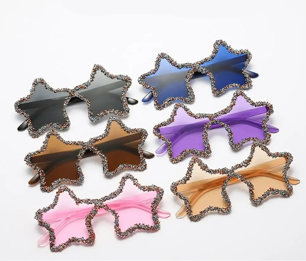 Star-shaped sunglasses in various colors on a white background