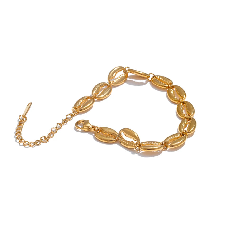 Gold bracelet on a white background