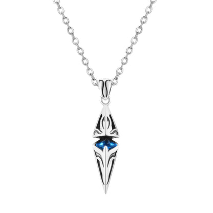 Silver pendant with blue gemstone on a white background