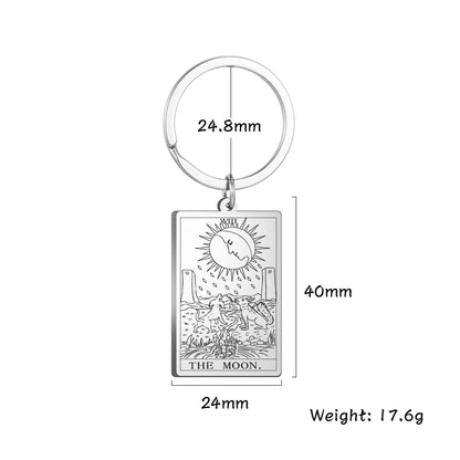Keychain with Tarot card design labeled 'The Moon' and measurements on a white background