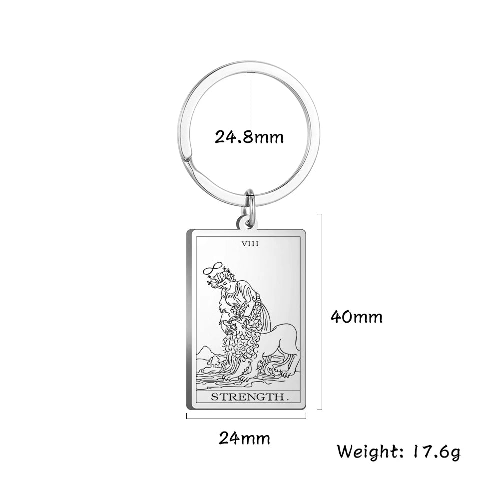 Keychain with Tarot card design and measurements on a white background
