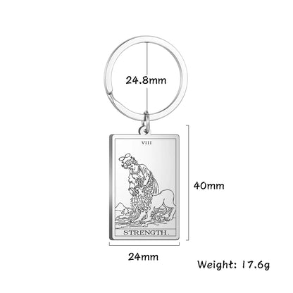 Keychain with Tarot card design and measurements on a white background