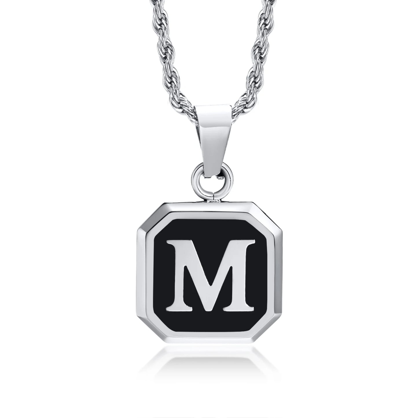 Necklace with a black pendant featuring the letter 'M' on a white background