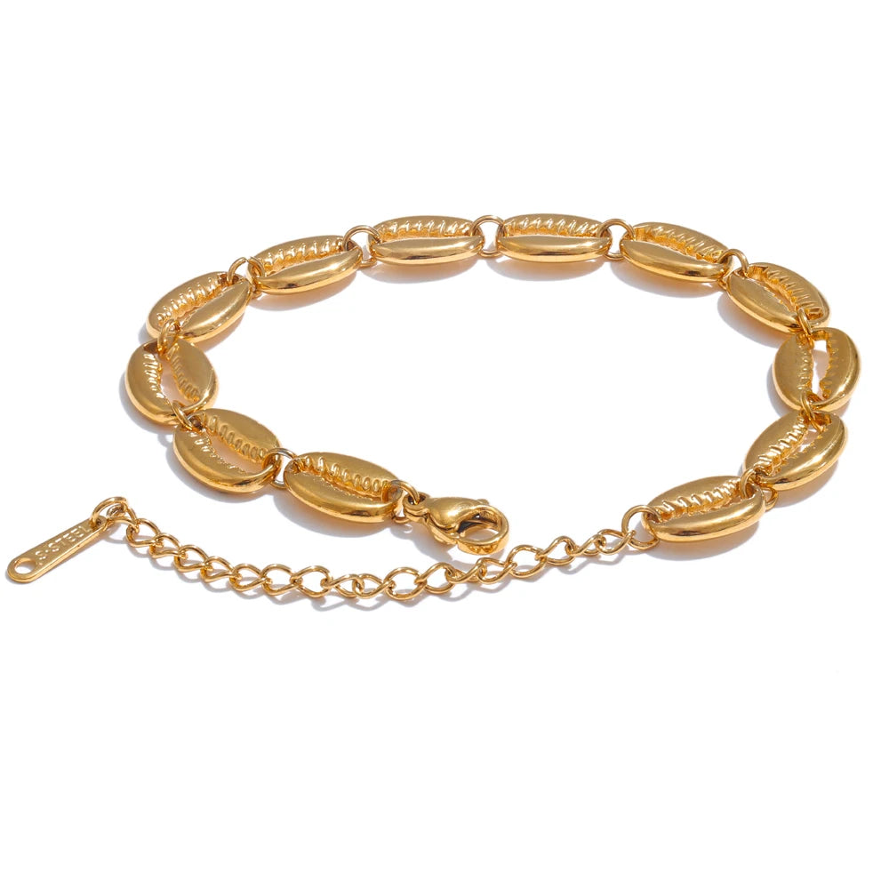 Gold bracelet with a chain link on a white background