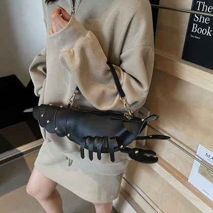 Person wearing a unique black handbag with claw-like design in a store setting.