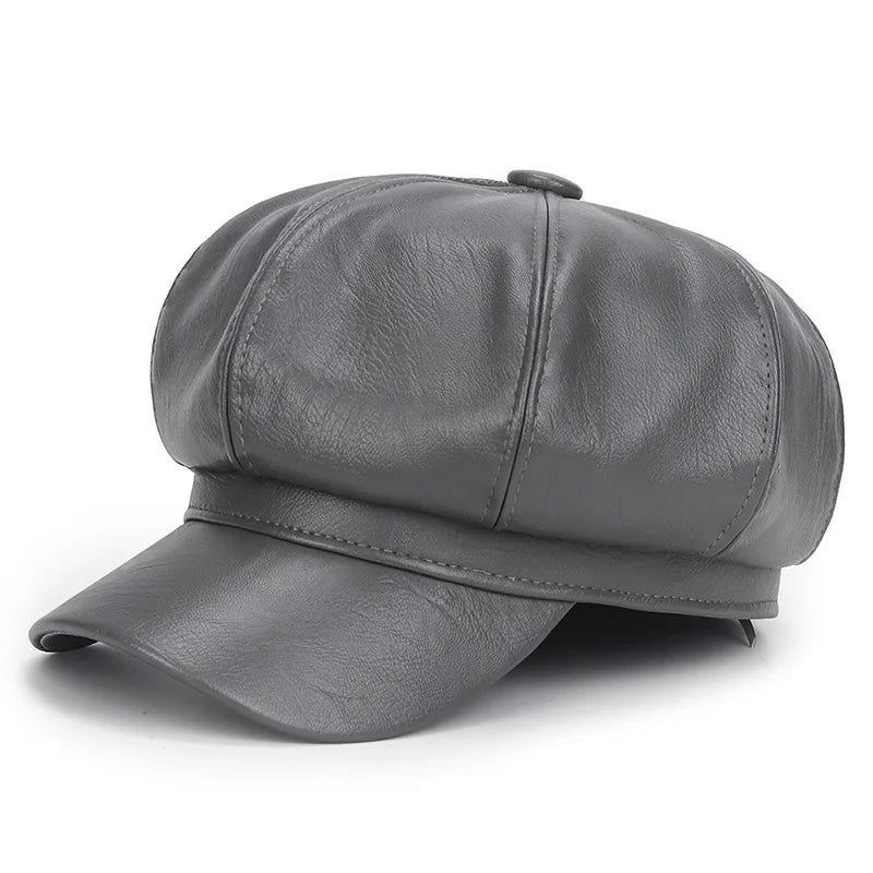 Grey leather cap on a white background