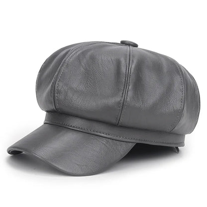 Grey leather cap on a white background