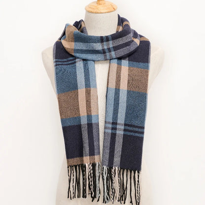 Plaid scarf with fringes on a mannequin against a white background