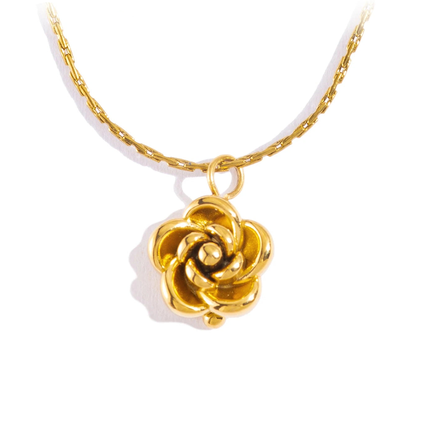 Gold rose necklace on a white background 