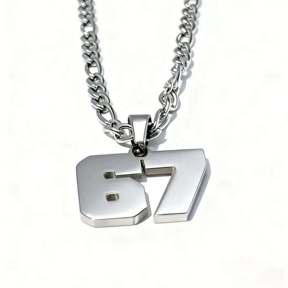 Silver necklace with number '67' pendant on a white background