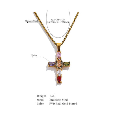 Gold cross pendant necklace with colourful stones on a white background