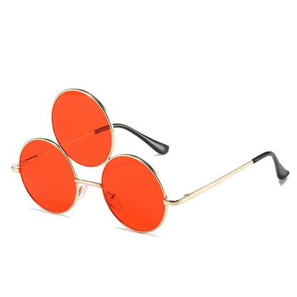 Round orange sunglasses with gold frames on a white background