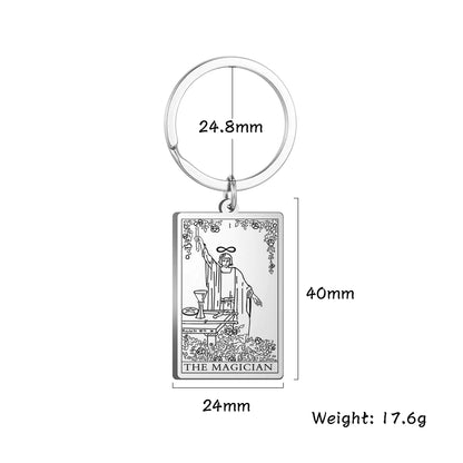 Keychain with 'The Magician' tarot card design and measurements on a white background