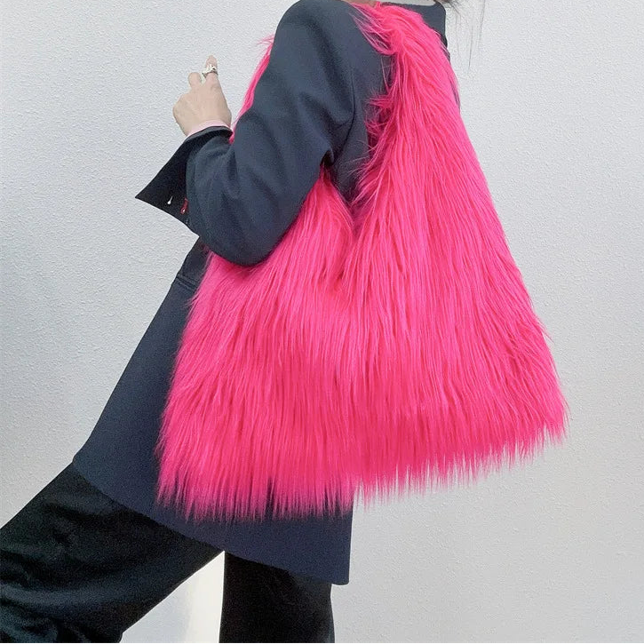 Person wearing a bright pink fluffy bag on a plain background