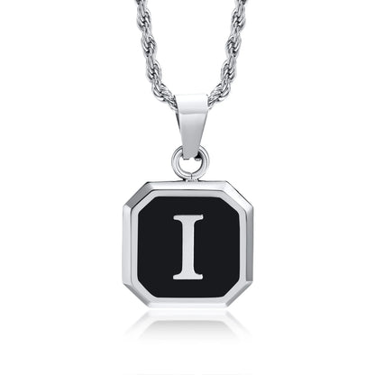 Necklace with a black octagonal pendant featuring the letter 'I'.