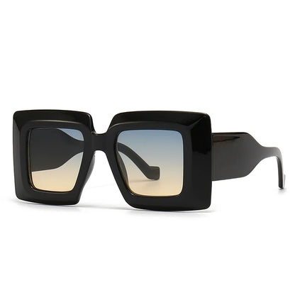 Black sunglasses with a reflective lens on a white background