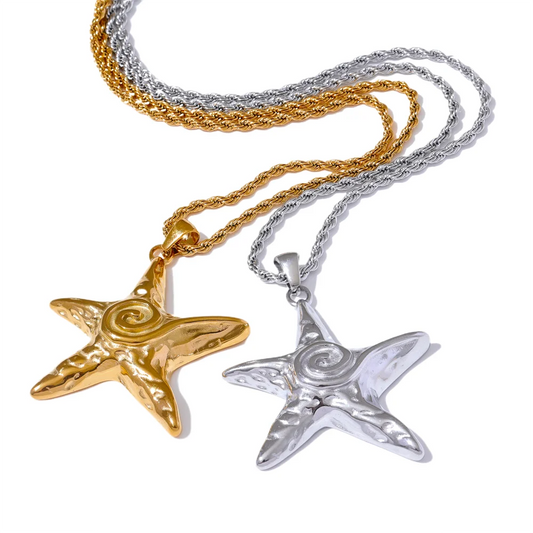 Gold and silver starfish pendants on chains.