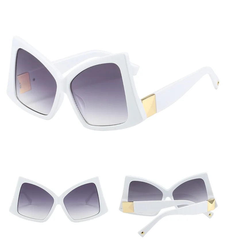 White oversized square sunglasses with gradient grey lenses and gold metal accents on the temples.