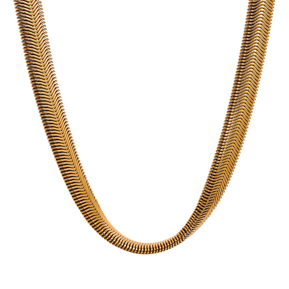 Thick gold snake chain necklace on a white background