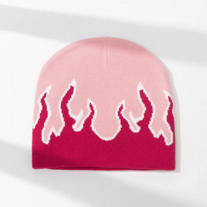 Pink beanie with white flame pattern on a white background