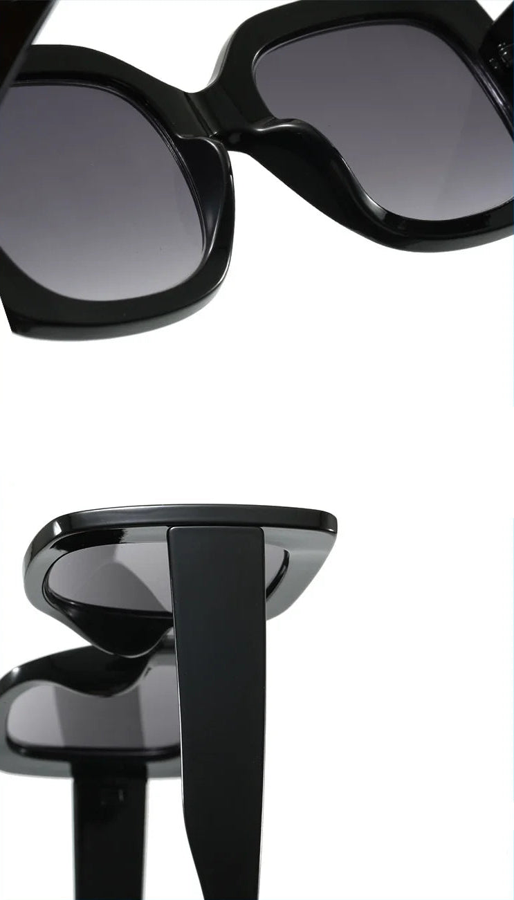 Close-up product views of black oversized sunglasses with dark tinted lenses, shown on a white background with blue border lines.