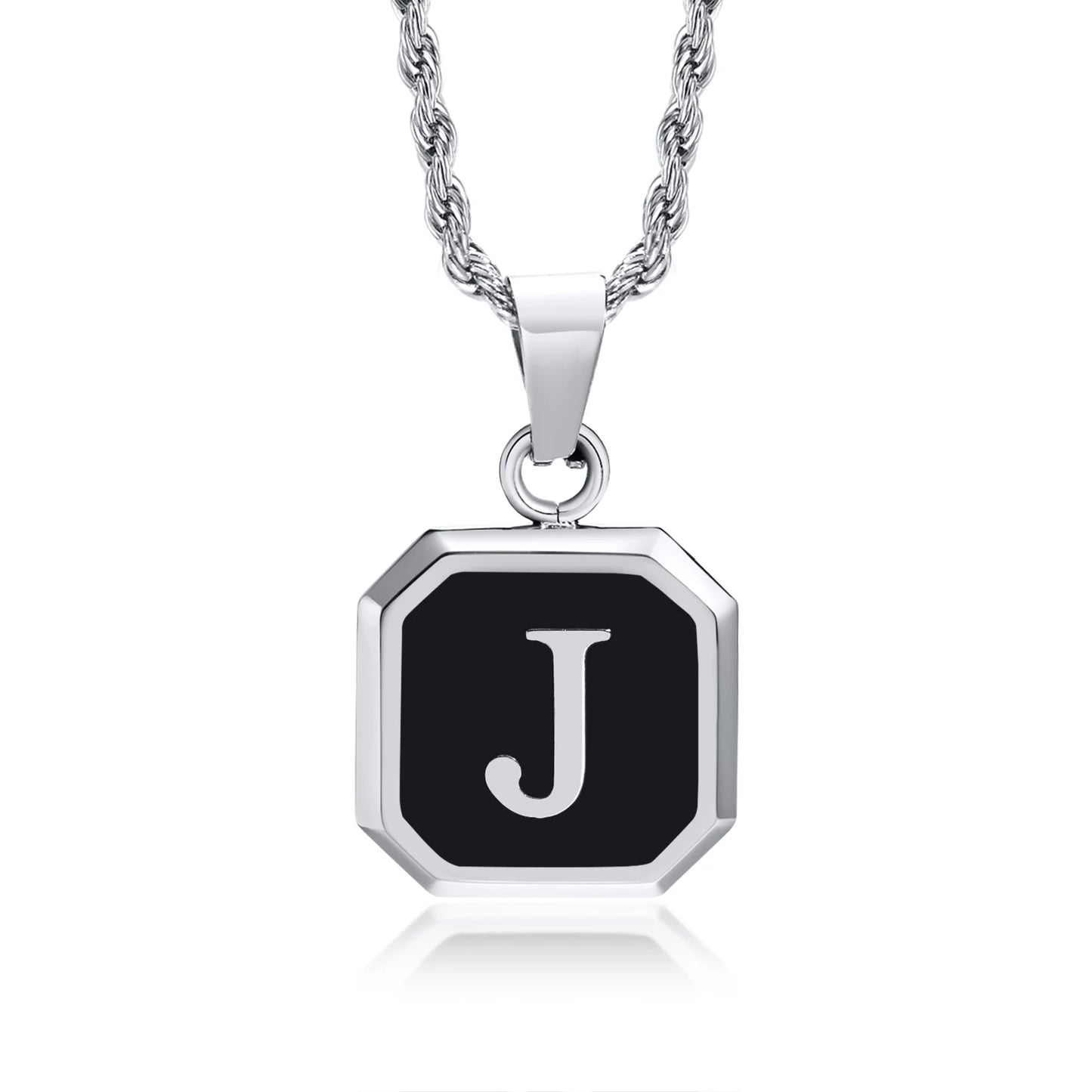 Necklace with a black octagonal pendant featuring the letter 'J' on a white background