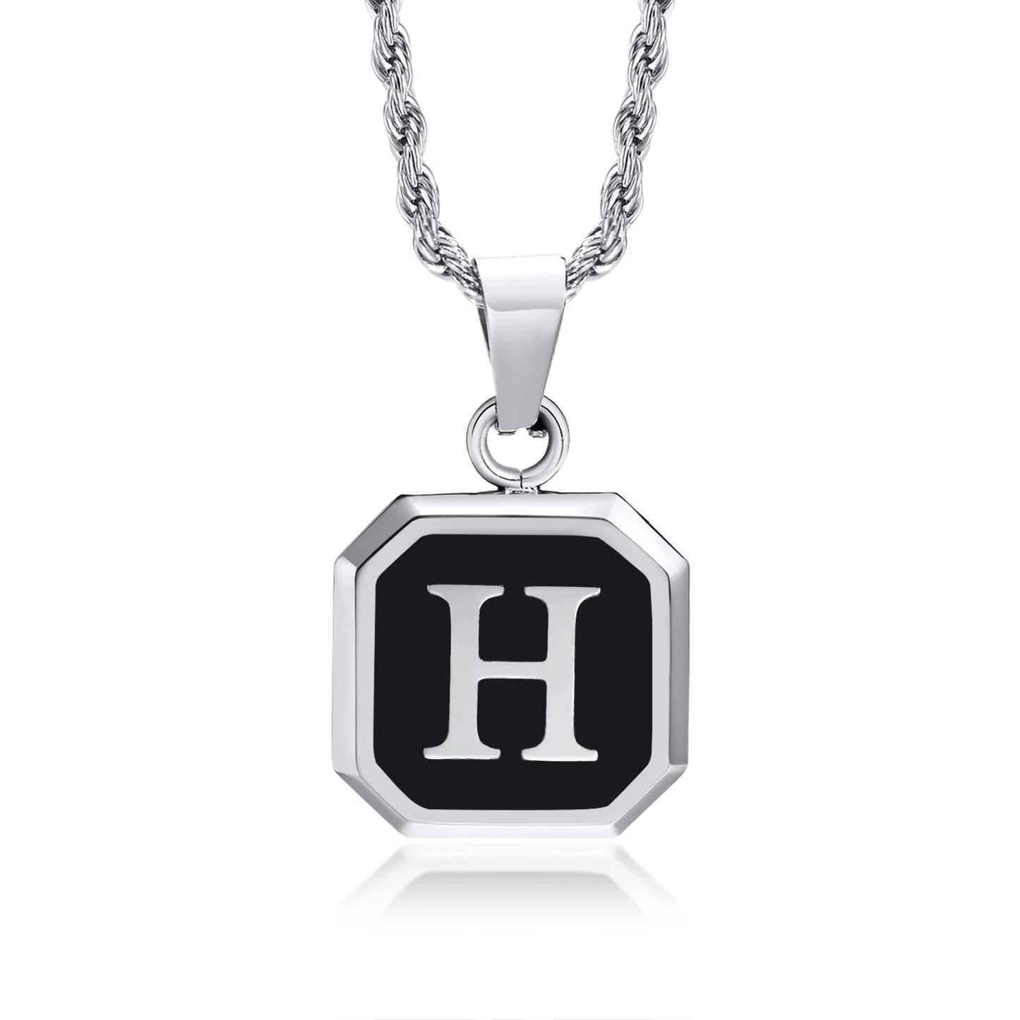 Silver necklace with a black octagonal pendant featuring the letter 'H' on a white background