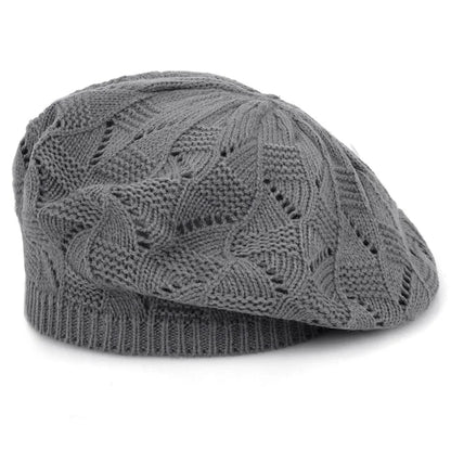 Grey knit beanie on a white background