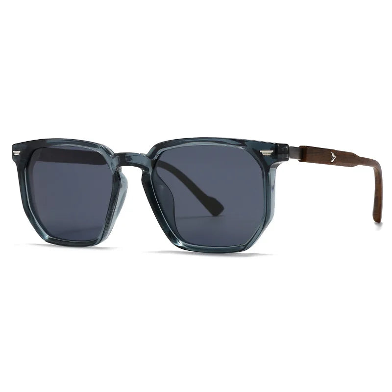 Sunglasses with dark lenses and a clear frame on a white background